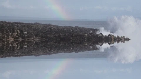 Reflected wild waves breaking in the atlantic coast with rainbow in slow motion Stock Footage 89232896