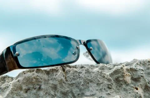 Reflecting in the sunglasses on the beach Stock Photos
