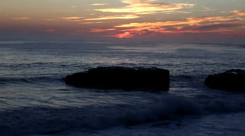 Reflecting Water on Rocks at Sunset in Santa Cruz, California Video stock 34306778