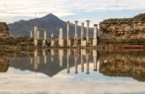 Reflection and ancient columns in the ancient city Stock Photos