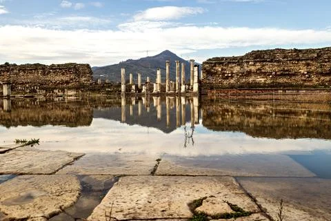 Reflection and ancient columns in the ancient city Stock Photos