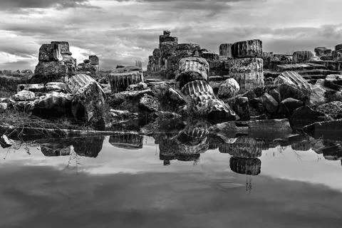 Reflection and ancient columns in the ancient city Stock Photos