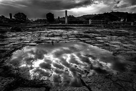 Reflection and ancient columns in the ancient city Stock Photos