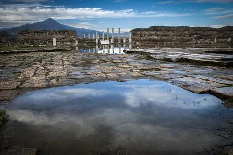 Reflection and ancient columns in the ancient city Stock Photos
