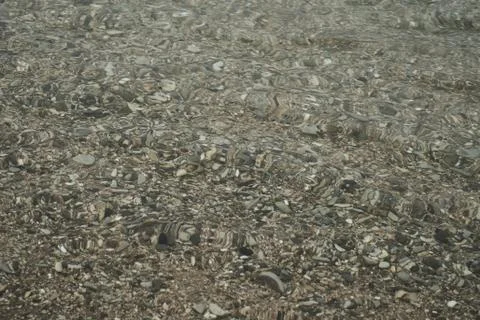 Reflection and refraction on the surface of the water. Abstract background. Stock Photos