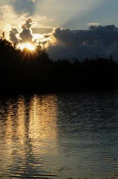Reflection and shadows over the surface of the lake 스톡 사진
