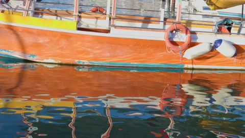Reflection and specular reflection of boats in blue water. Stock Footage 283364186