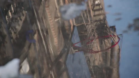 A reflection of a basketball hoop Stock-Footage 329994337