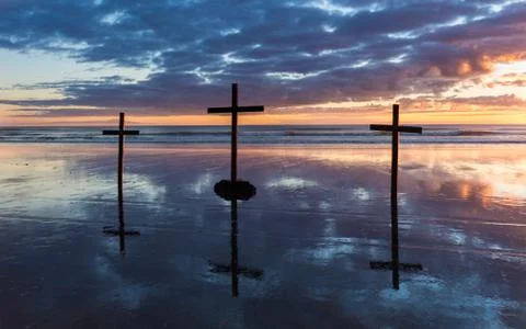 Reflection beach crosses Stock Photos