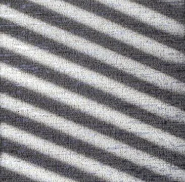 Reflection from the blinds on the wall, texture and structure. light gray shades 스톡 사진