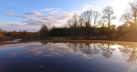 The reflection of blue sky, clouds and trees on the mirror surface - 2 스톡 동영상 87198268
