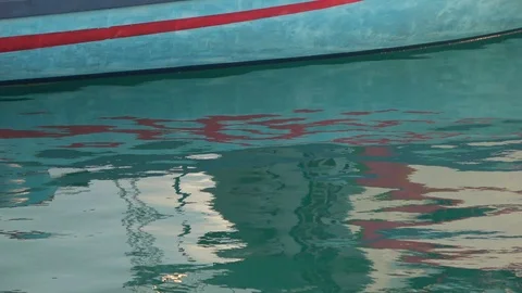 Reflection of the boat in the calm surface of the water. Indian Ocean video Stock Footage 88411501