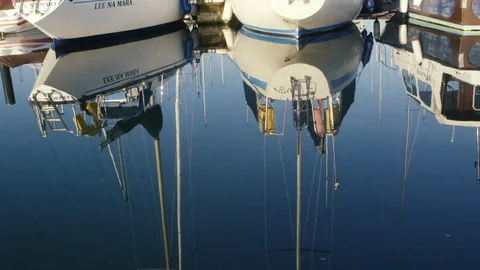 Reflection of boats on the surface of water Video stock 127849108