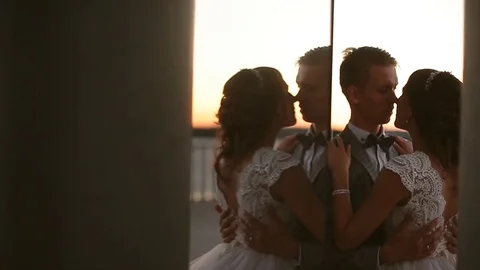 The reflection of the bride and groom Stock Footage 81598676