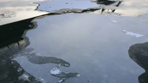 Reflection of the bridge in the river. aerial footage from the bottom Stock Footage 145305662