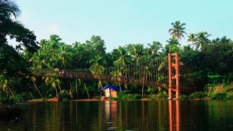 Reflection of bridge in river at Kerala Stock Photos