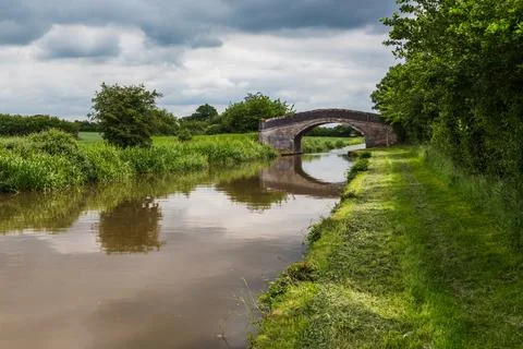 Reflection of a bridge on the water Stock Photos
