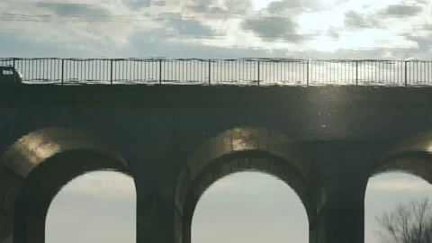 Reflection of the bridge on the water surface of the river Video stock 123170052