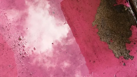 Reflection of a building and clouds in a puddle on the famous Rua Cor de Rosa Stock Footage 109381276