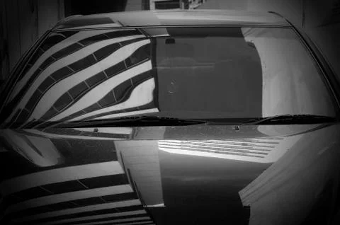 Reflection of building and sky on the car Ilustración de archivo