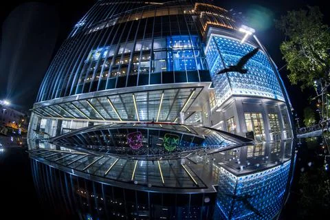 Reflection of building lights in car window Foto stock