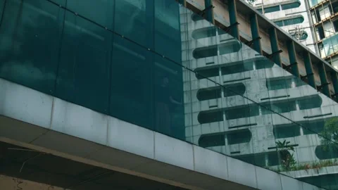 Reflection of Building in Modern Glass Facade Stock Footage 249363085