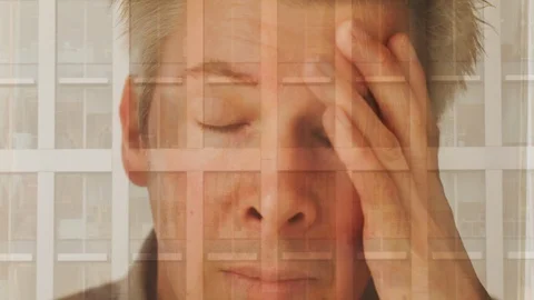 Reflection of a businessman looking at a modern office at night Video stock 104253489
