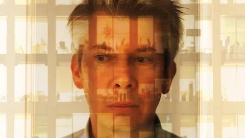 Reflection of a businessman looking at a modern office at night Video stock 104255880