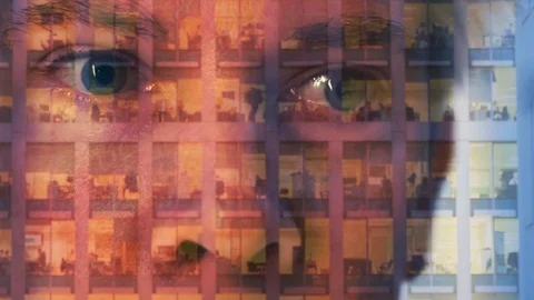 Reflection of a businessman looking at a modern office at night Video stock 104259381