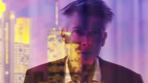 Reflection of a businessman looking out of a window in Frankfurt Video stock 80695993