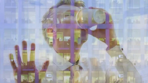 Reflection of a businessman looking out of a window drinking coffee Video stock 80744167