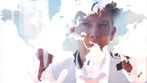 Reflection of a businessman looking through a map of the world Video stock 80933728