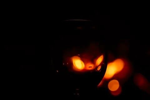 Reflection of a campfire in a glass for backgrounds Stock Photos