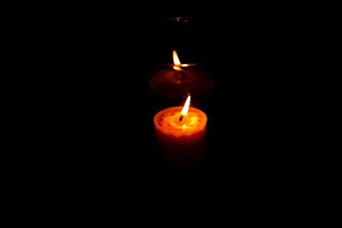 The reflection of a candle in the dark Fotos Stock