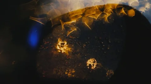 Reflection of car headlights in the rearview mirror with droplets Stock Footage 124134097
