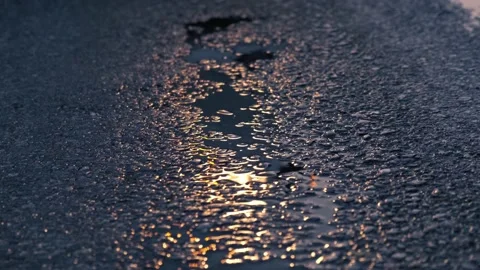 Reflection car headlights in wet asphalt and puddle, road safety concept. Stock-Footage 152009295