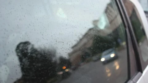 Reflection of car traffic on rainy car window Video stock 40341442