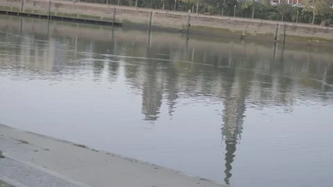 Reflection of the cathedral from the other side of the Seine, sunset, 4K, F-log Stock Footage 139173216