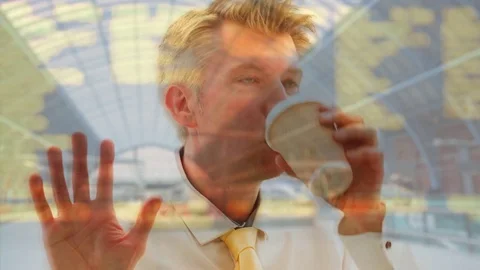 Reflection of a caucasian businessman looking out of a railway station window Video stock 80793495