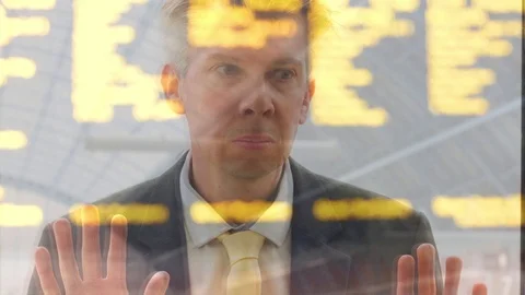 Reflection of a caucasian businessman looking out of a railway station window Video stock 80793585