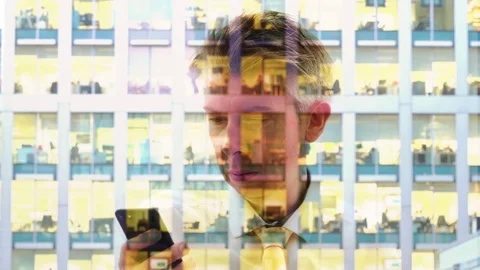 Reflection of a Caucasian businessman using smartphone Video stock 80739959