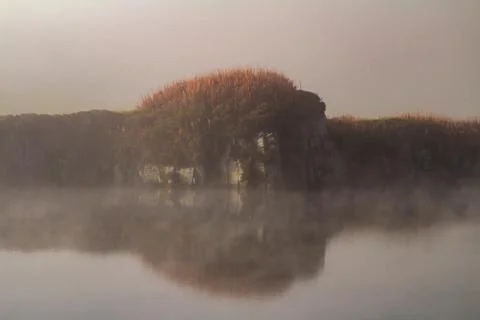 Reflection on Cawfields quarry pond Stock Photos