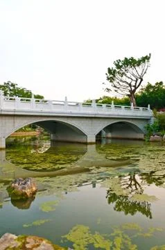 Reflection of chinese stone bridge Stock Photos