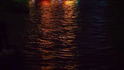 Reflection of Christmas Lights on the Water Stock Footage 231910773
