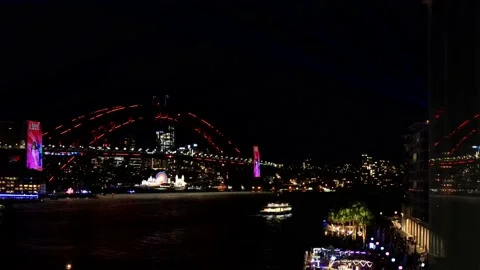 Reflection of Circular Quay waterfront at Vivid Sydney festival at night as 4k. Stock Footage 205334096