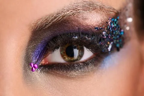 Reflection of the city in makeup eye. Close up Stock Photos