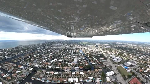 Reflection of the city on a wing of a plane, Miami, Florida, view from wing Stock Footage 148534686
