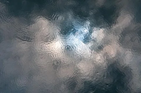 Reflection of clouds and sun in water in the Southern Bug River, Ukraine Foto stock