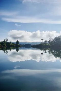 Reflection of the clouds on the lake Stock Photos