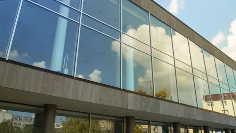 Reflection of Clouds Moving inside a Large Modern Window-Front Видео 120554585
